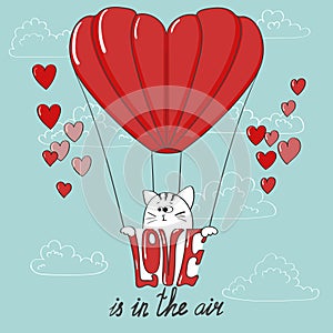 Love is in the air. Cute cartoon cat and the air balloon