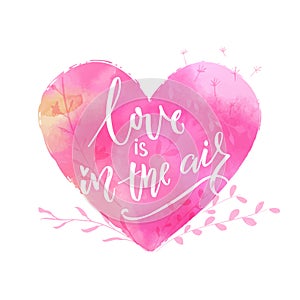 Love is in the air. St. Valentine`s day greeting card with pink watercolor heart.