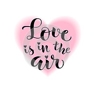 Love is in the air. Vector lettering. Decorative phrase about love for Valentines Day card or holiday design