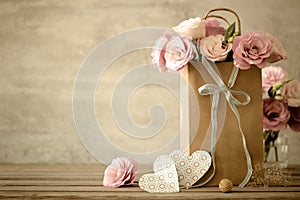 Love background with flowers and bow