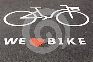 We love bike symbol on a road