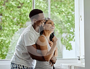 Love, black couple and hug in bathroom, smile and bonding together for relationship, dating and weekend. Romance, man