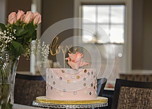 Love Cake Topper Gold on Wedding Cake