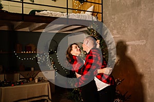 Love, christmas, couple, proposal concept - happy man giving diamond engagement ring to woman