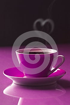 Love for coffee: aromatic brew with heart-shaped steam