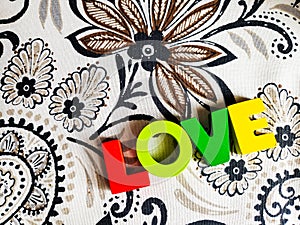 Love in colorful block letters