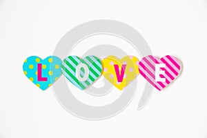 Love in colorful hearts isolated on white background