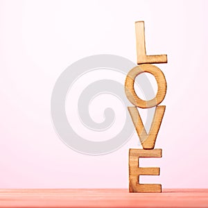 Love composition of wooden letters