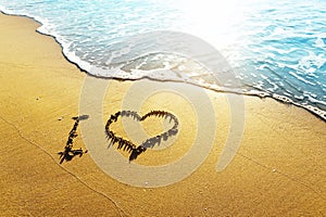 Love concept on a beach sand
