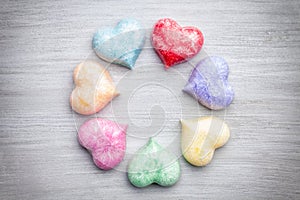 Love concept. Colorful hearts on grey background