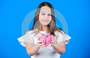 Love concept. Girl cute child show heart toy. Heart symbol of love. Kid adorable girl happy face show heart blue
