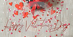 Love concept for mothers day and valentine`s day. Happy Valentines day hearts on wooden background.