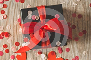 Love concept for mothers day and valentine`s day. Happy Valentines day hearts on wooden background.