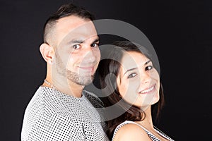 Love couple happy smile romantic together in black background