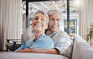 Love, couple and retirement with a senior woman and man on a sofa to relax in their home together. Happy, smile and