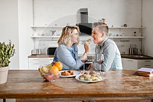 Love couple sitting at the table, romantic dinner