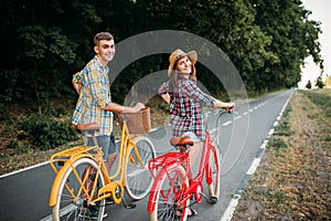 Love couple walk on vintage bikes romantic journey