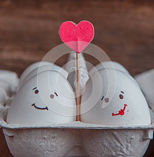 Love eggs couple with heart in the box photo