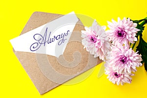 Love envelope and letter with written word always with pink chrysanthemum flowers