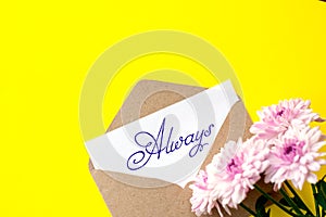 Love envelope and letter with written word always with pink chrysanthemum flowers