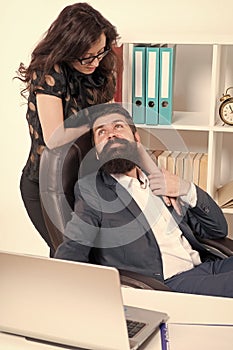 Love is everywhere. Love affair of businessman and sexy woman. Couple in love conducting affair at work. Boss and