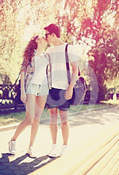 Love, fashion and people concept - summer stylish pretty couple