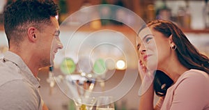 Love, flirt and couple on date in restaurant enjoying company, drinks and laugh together at social event. Relationship