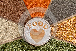 Love food concept - plant based food with diverse grains and seeds