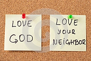 Love God, love your neighbor, handwritten notes on a pinning board, the greatest commandment by God Jesus Christ