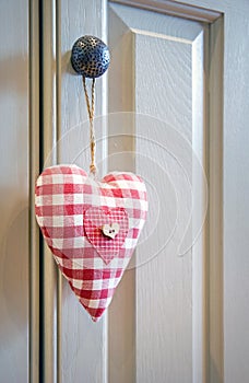 Love heart hanging on door knob