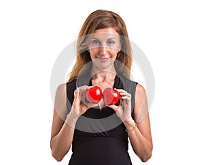 Love heart, protect and healthcare concept : Caucasian woman holding red heart on her chest and heart position isolated on white