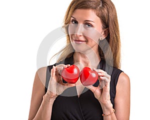 Love heart, protect and healthcare concept : Caucasian woman holding red heart on her chest and heart position isolated on white