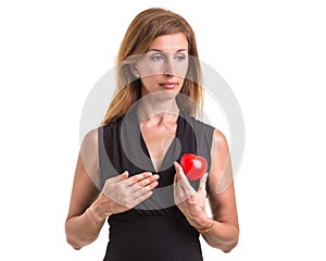 Love heart, protect and healthcare concept : Caucasian woman holding red heart on her chest and heart position isolated on white