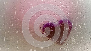 Love Heart with Rain Drop View From Car Window 4K Animation. Rain Drops On The Car Window