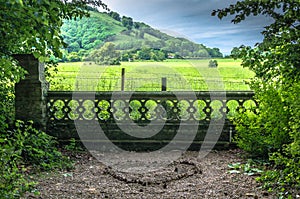 Love heart shape on the ground with a countryside view