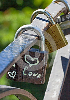 Love heart symbol. Bunch lock. Chain with many metal lockers