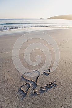 Love hearts and Forever written on a pristine beac photo