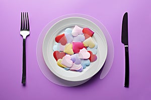 Love hearts in plate. Sex flirt concept. Fall in love in different partners. Pick a new girlfriend or boyfriend. Promiscuity and