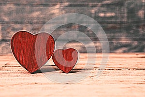 Love hearts on wooden texture background. Valentines day card concept. Heart for Valentines Day Background