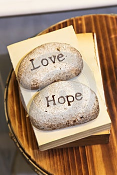 Love and Hope engraved on stones