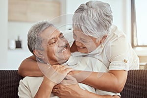 Love, hug and elderly couple on a sofa, happy and relax, laughing and talking their home together. Embrace, smile and