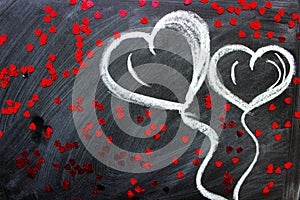 Love. I love you. Message of love. The inscription on the blackboard with chalk. Valentine`s day theme. Dark grunge texture backgr