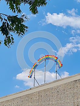 love invents us rainbow sign on building lgbti pride month photo