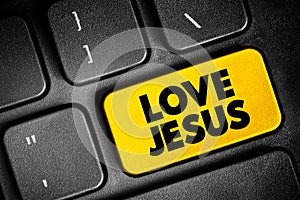 Love Jesus text button on keyboard, concept background