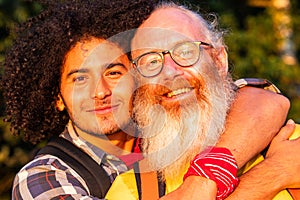 Love Knows No Bounds: Joyful Gay Couple Embracing in Nature