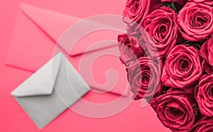 Love letter and flowers delivery on Valentines Day, luxury bouquet of roses and card on pink background for romantic holiday