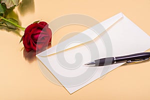 Love letter and a rose on a golden background