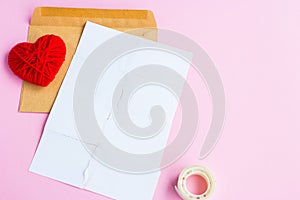 Love letter torn with red hearts