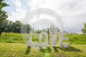 Love letters on a dyke on grass photo