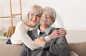 Love Lives Forever! Senior Couple Hugging At Home